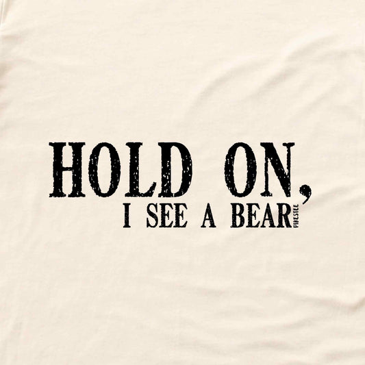 Hold on, I see A Bear T-shirt